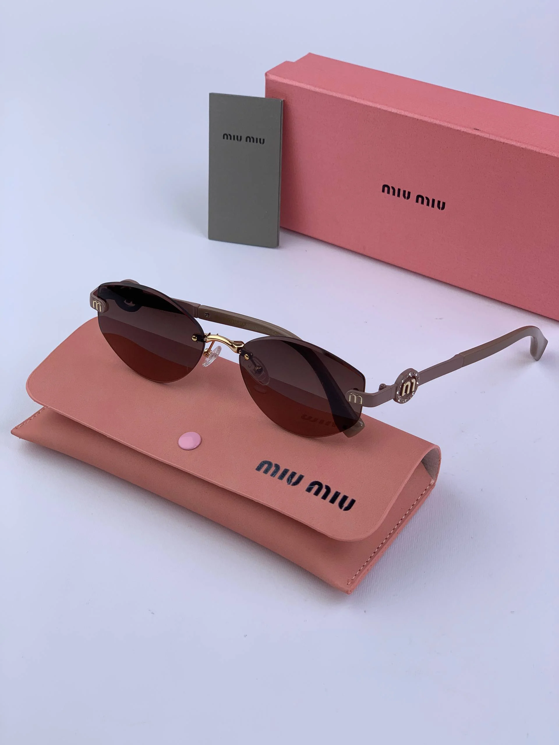 عینک آفتابی فلزی فریم لس زنونه برند  میو میو کد 8938